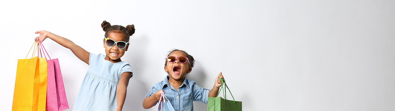 Young child holding shopping bag